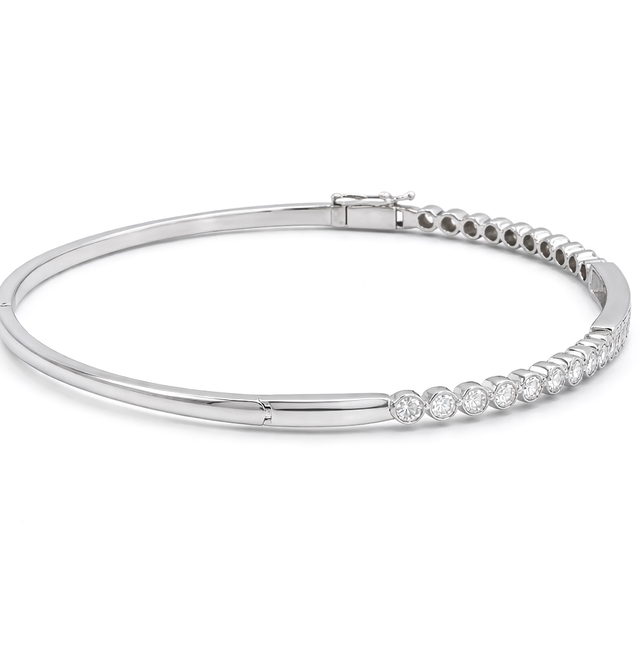 Diamond Bangles 18 KT GW- 9.8 G   NW-9.59 G   CVD-1.03 CTS  VVS