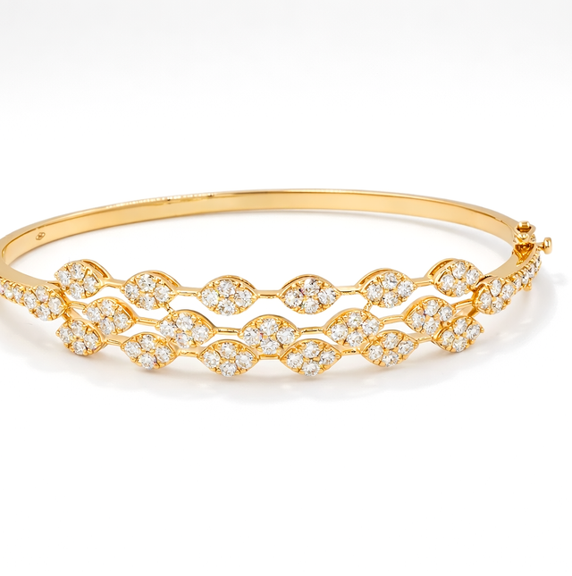 Diamond bangles  18 KT    GW-14.25 G   NW-13.73 G   CVD-2.64 CTS  VVS