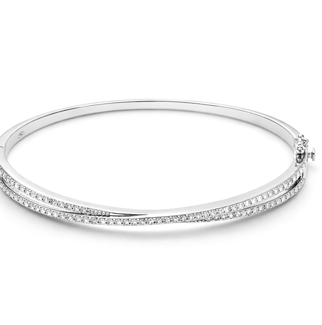Diamond Bangles 18 KT   GW-11.25 G   NW-11.15 G   CVD-0.48 CTS  VVS