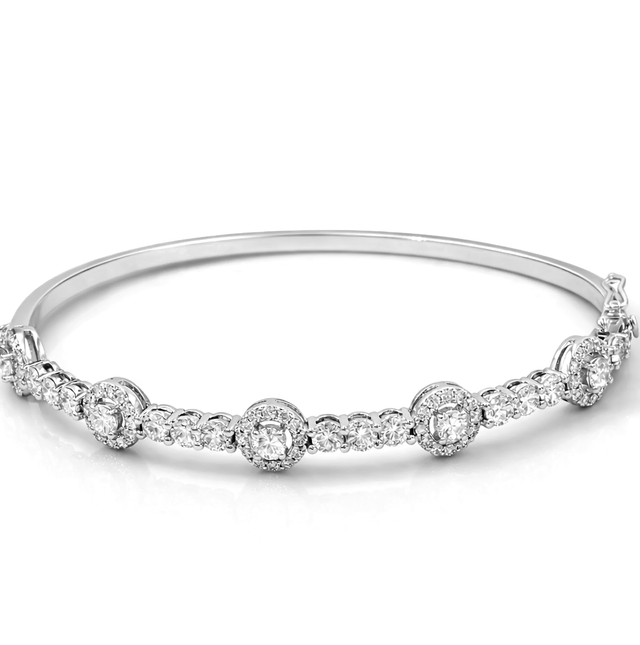 Diamond Bangles  18 KT  GW-10.76 G   NW-10.14 G   CVD-3.1 CTS  VVS